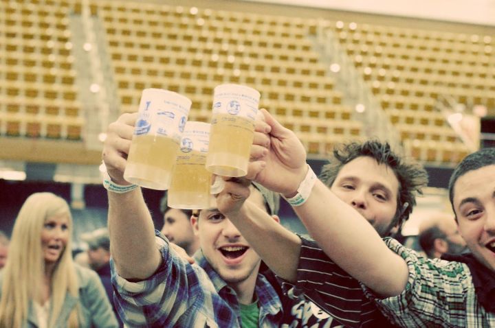 Young white men drinking beer, photo by Crystal Anderson